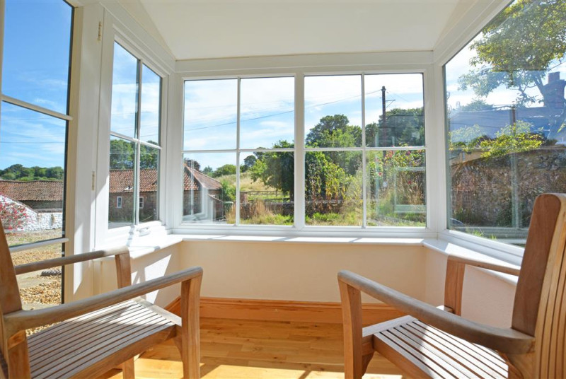 This property has the added luxury of this delightful sun room