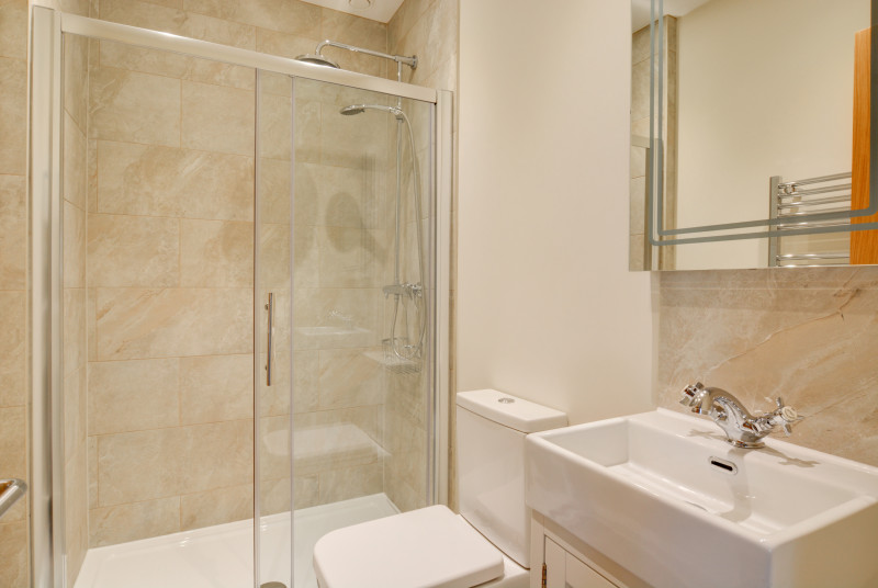 Walk in shower and sink unit