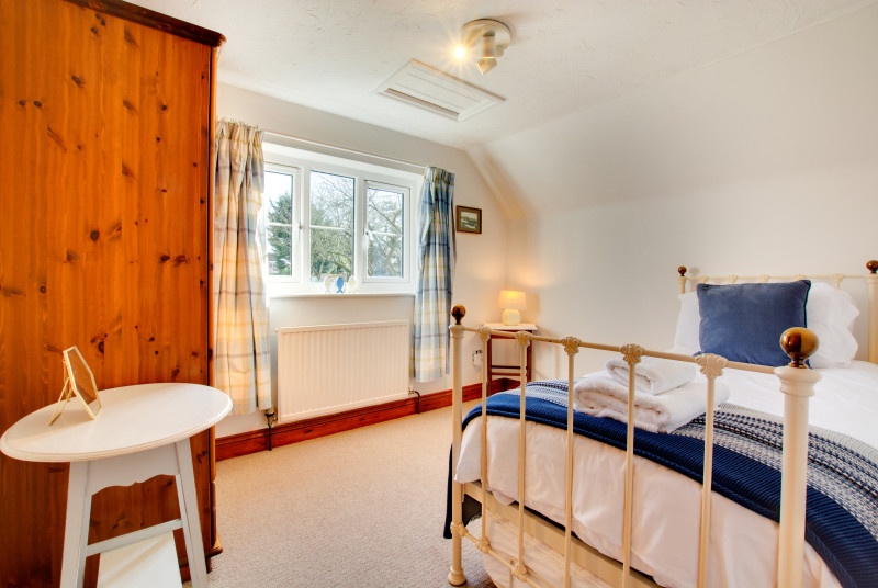 The single bedroom is a quite haven with a sunny outlook