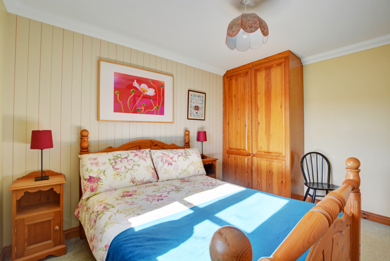 Storage and seating in the main bedroom