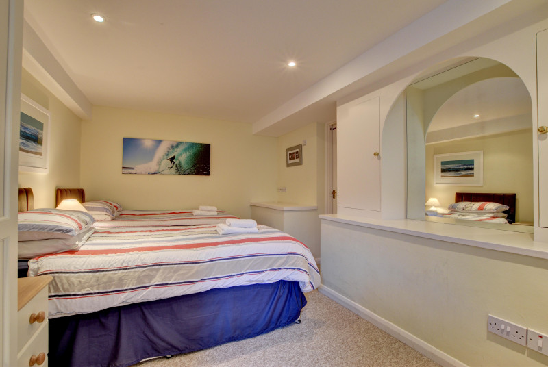 The twin bedroom with ensuite bathroom and Jacuzzi spa bath