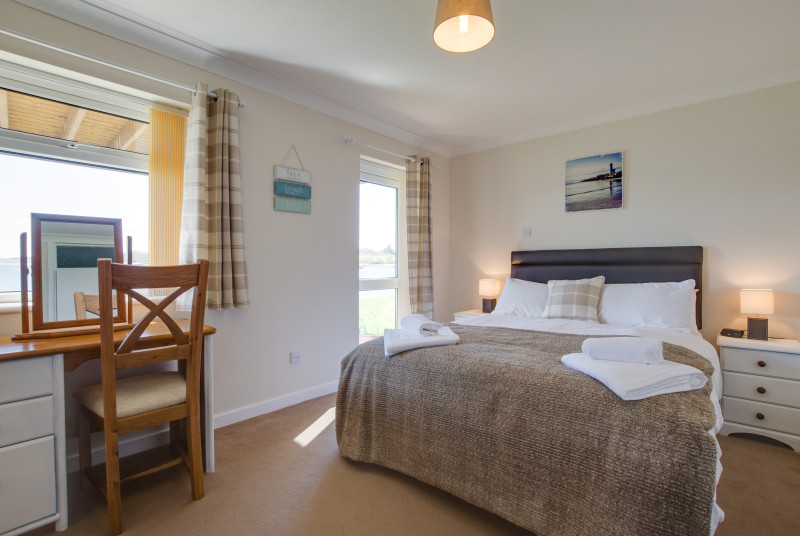 Ground floor bedroom with doors to terrace