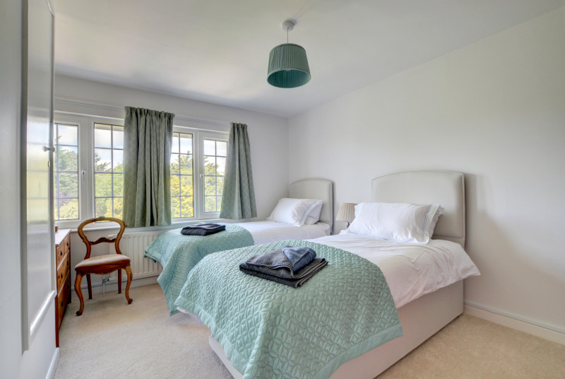 One of the spacious twin bedrooms