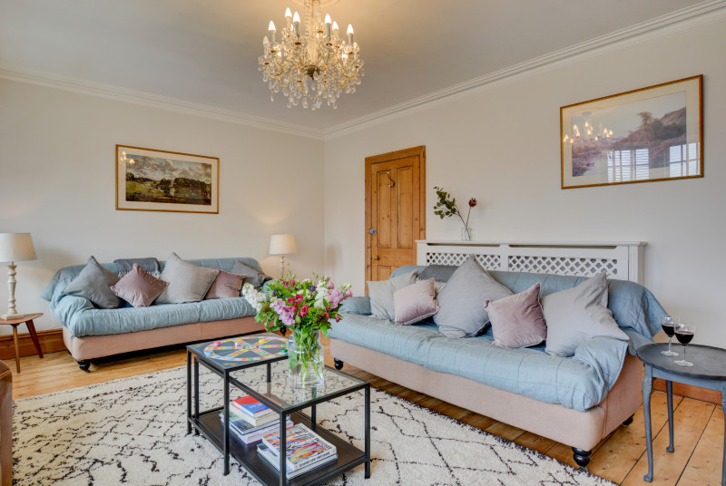 First floor sitting room with comfortable sofas