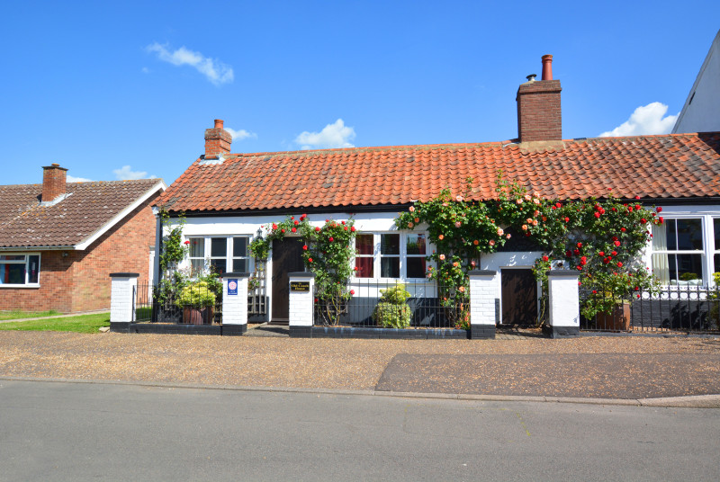 This skilfully converted former coach house has many character features such as beamed ceilings, wall timbers and an inglenook fireplace