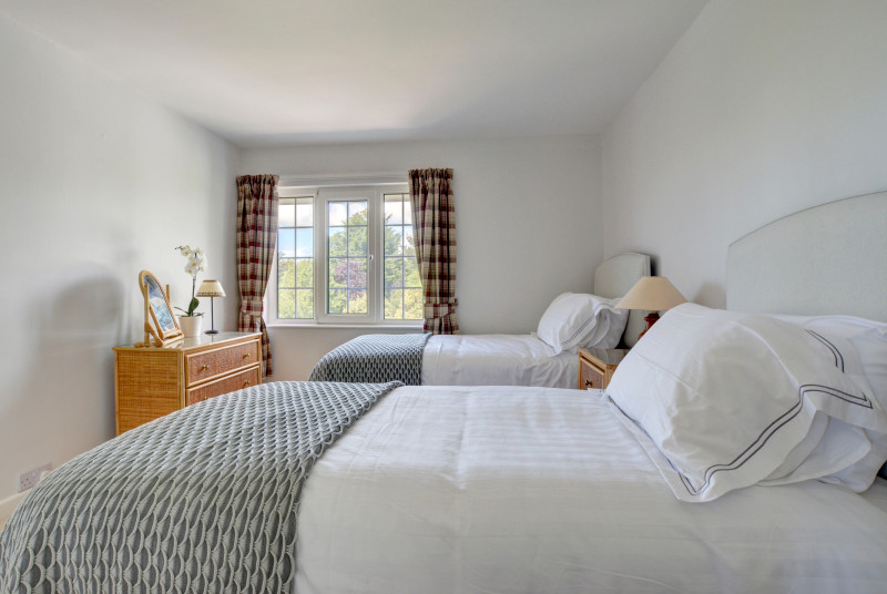 One of the spacious twin bedrooms