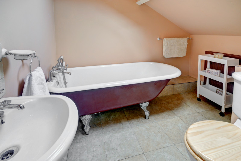 The en suite bathroom with claw foot bath