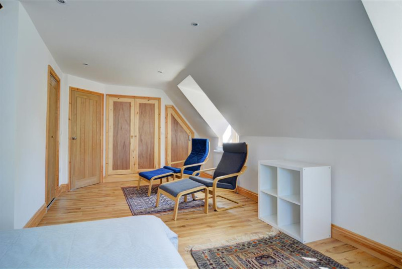 Seating and storage in the main bedroom