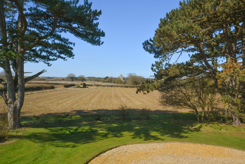 View from Bedroom 1 across the fields to the church