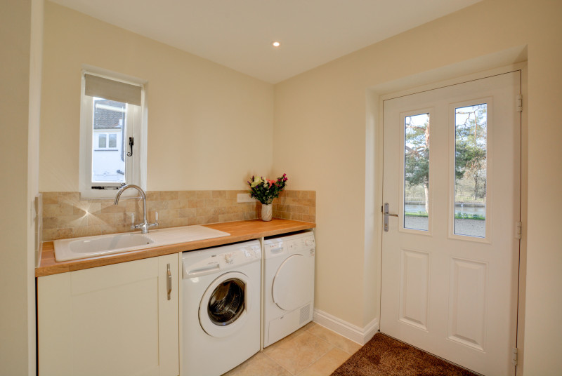Utility Room with washing machine and tumble drier