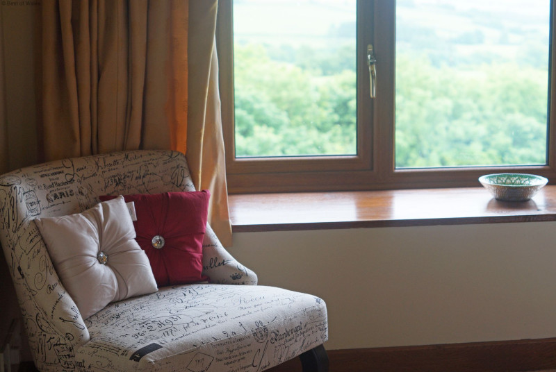 Chair to enjoy the far reaching views from the master bedroom