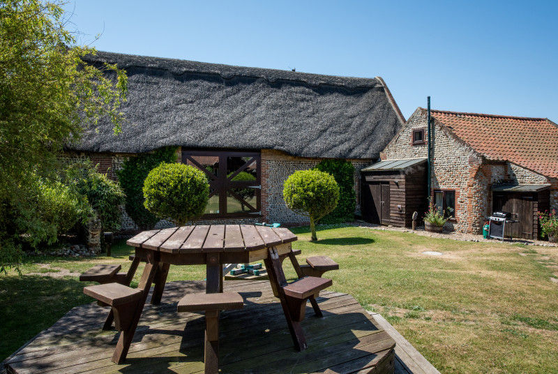 Each cottage has its own private area with table, chairs and gas barbecue for al fresco dining. There is also shared use of the extensive gardens with a summerhouse, outdoor chess set and swingball 
