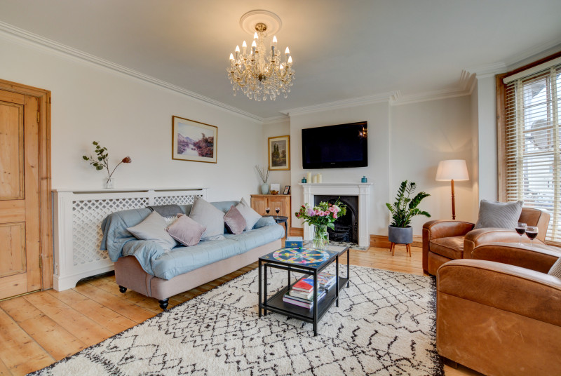 First floor sitting room with feature fireplace