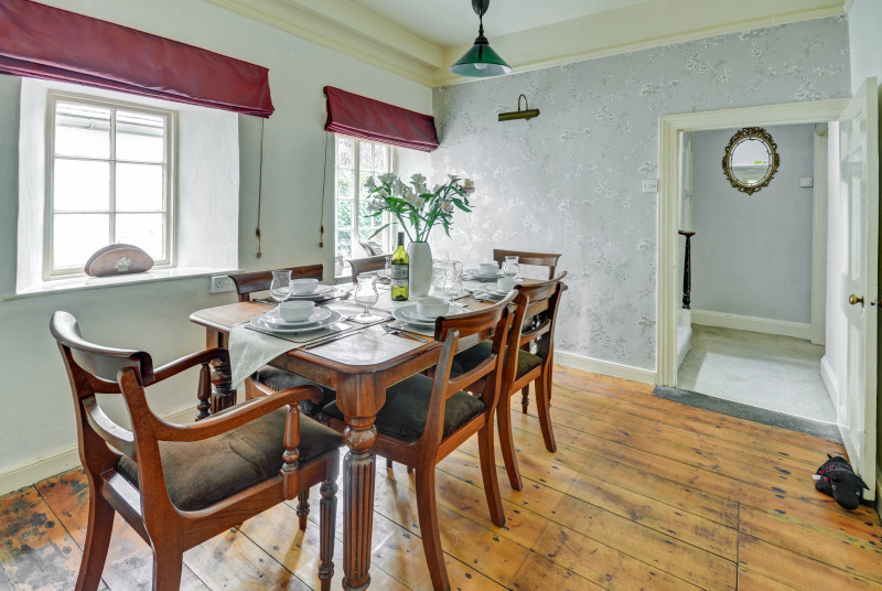 The separate dining room provides a space for formal or informal dining