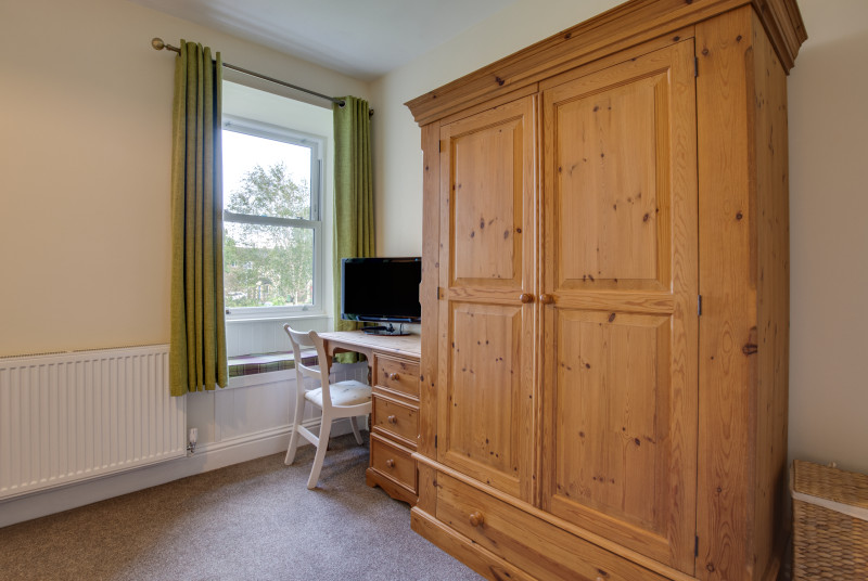 Master bedroom with en suite and TV