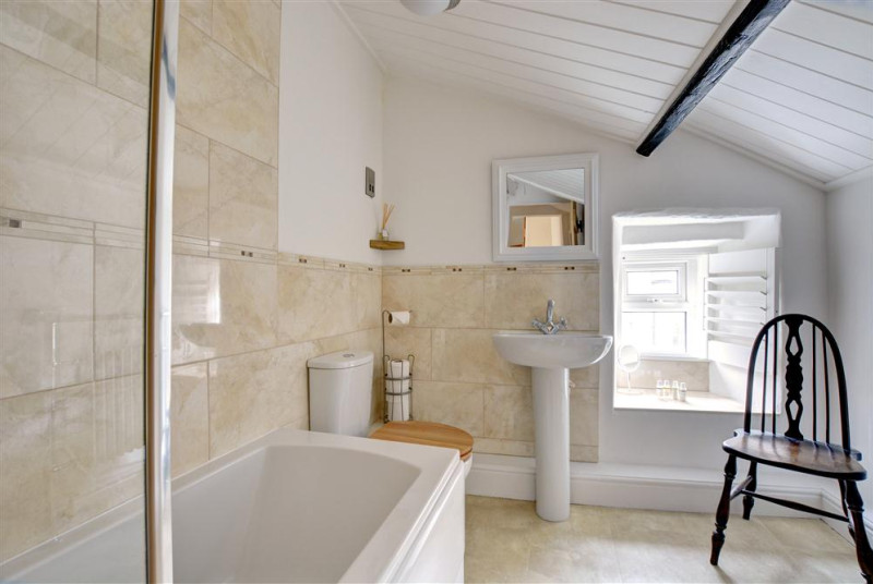 Lovely modern bathroom suite is perfect for a relaxing soak.
