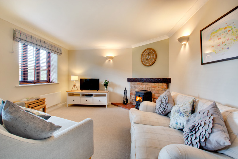 Offering the perfect space to relax in the sitting room after a day of exploring
