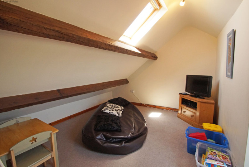 Cosy 'snug' room with TV & games - a perfect retreat for the children.