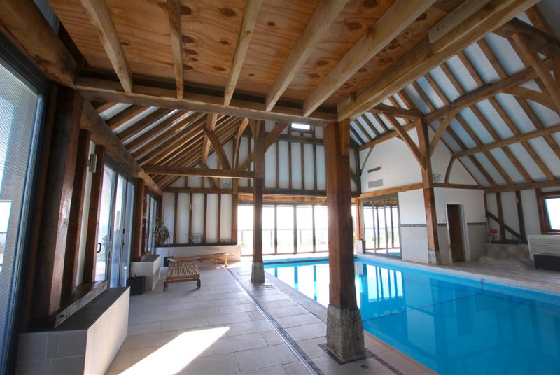 Absolutely stunning pool with views right across the Weald over the orchards. This will take your breath away......
