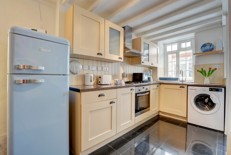 The compact kitchen is well equipped