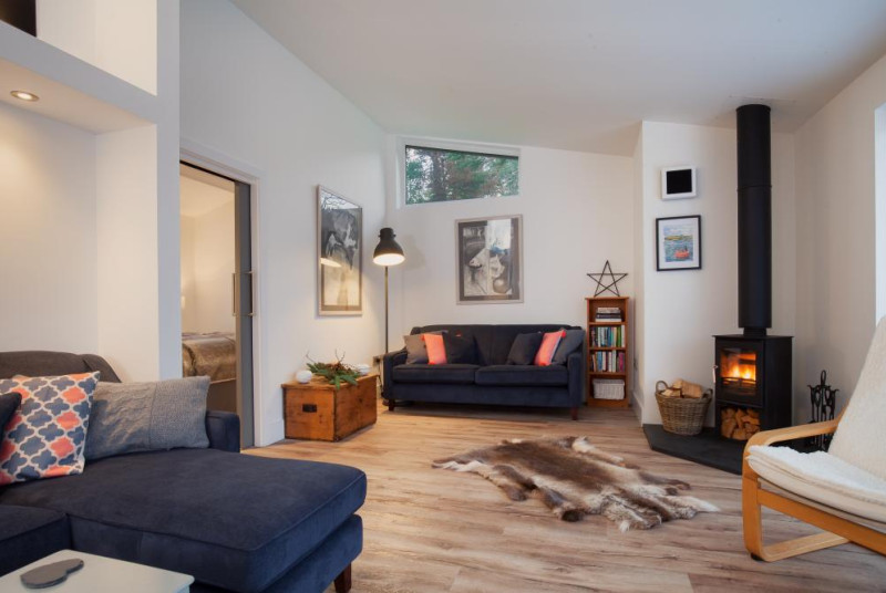 Hygge House, Shaldon - Living area with log fire