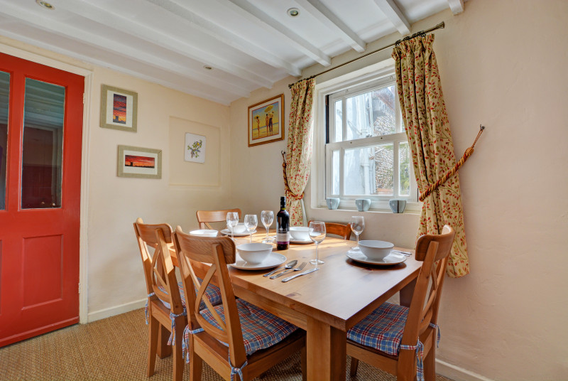 Light and airy dining room with table and six chairs, perfect for family meals