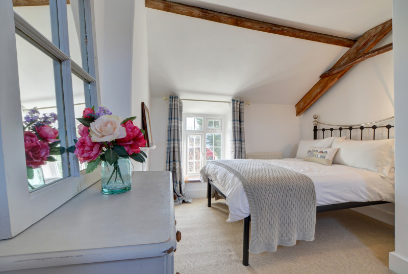 The master bedroom is decorated in calming colours 