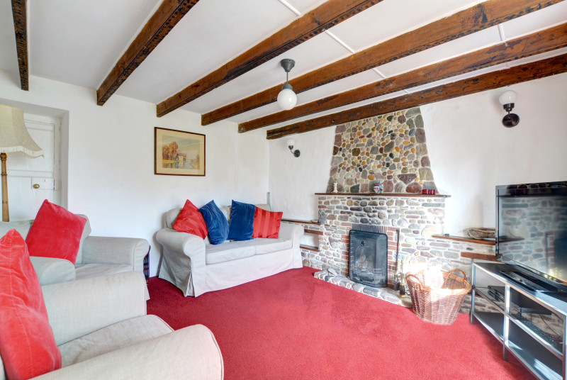The sitting room has an open fire, with its own digital TV & Blu-ray DVD player