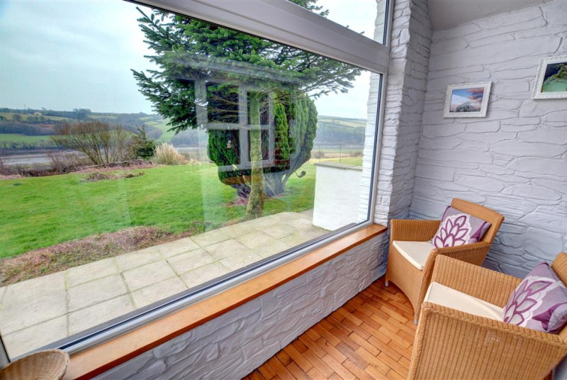 This cottage has a glass porch which enables you to see the views of the surrounding area