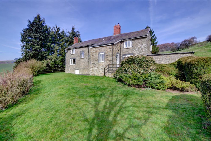 Black Patch is a detached stone former farmhouse in a secluded, elevated position, near Presteigne
