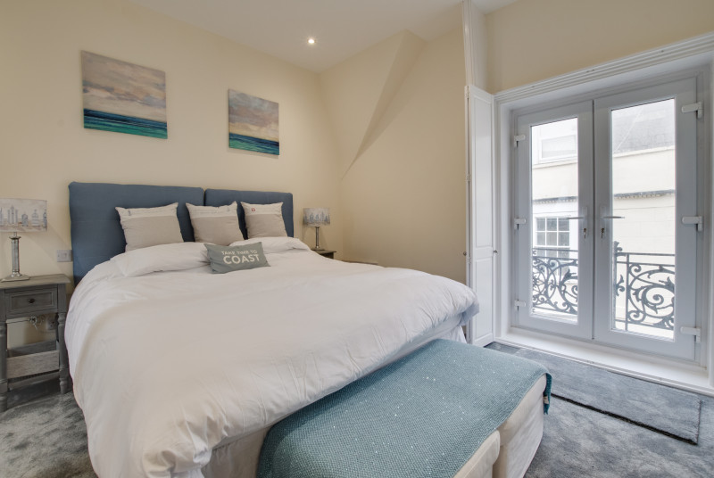 Master bedroom with Juliette balcony and ensuite bathroom