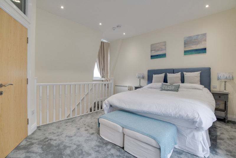 Master bedroom with Juliette balcony and ensuite bathroom