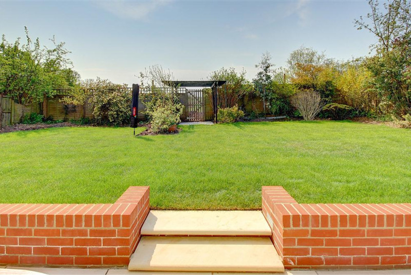 A plush spacious garden will allow for relaxation as well as playtime.