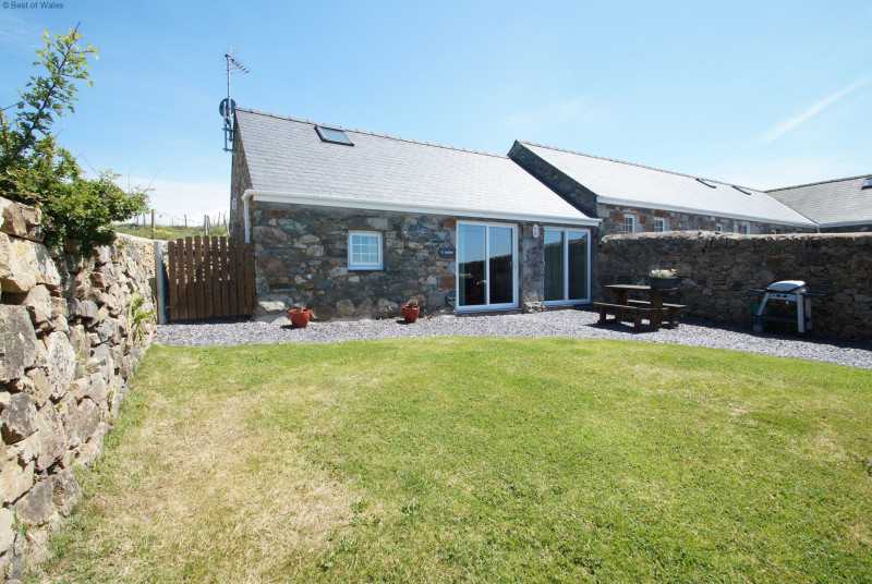 The patio is perfectly located to capture the sea & countryside views