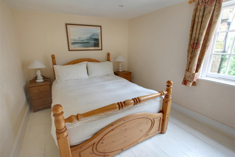 Slightly larger double bedroom with lovely pine bedstead